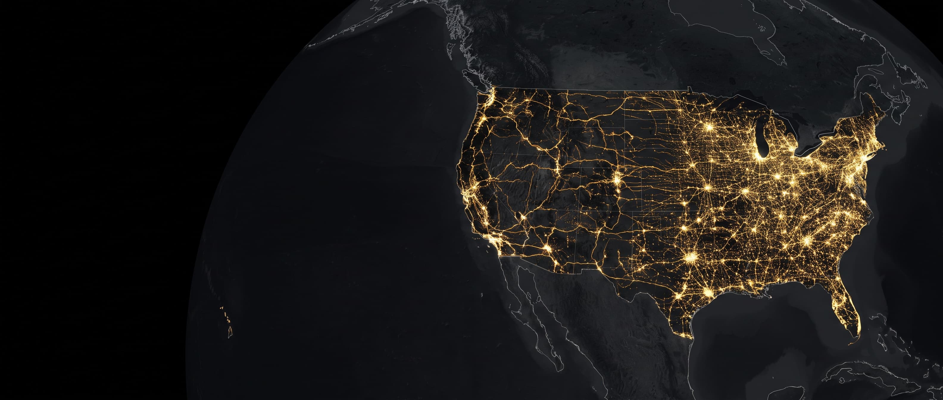 Earth from space at night with the United States lit by a gold network of signals
